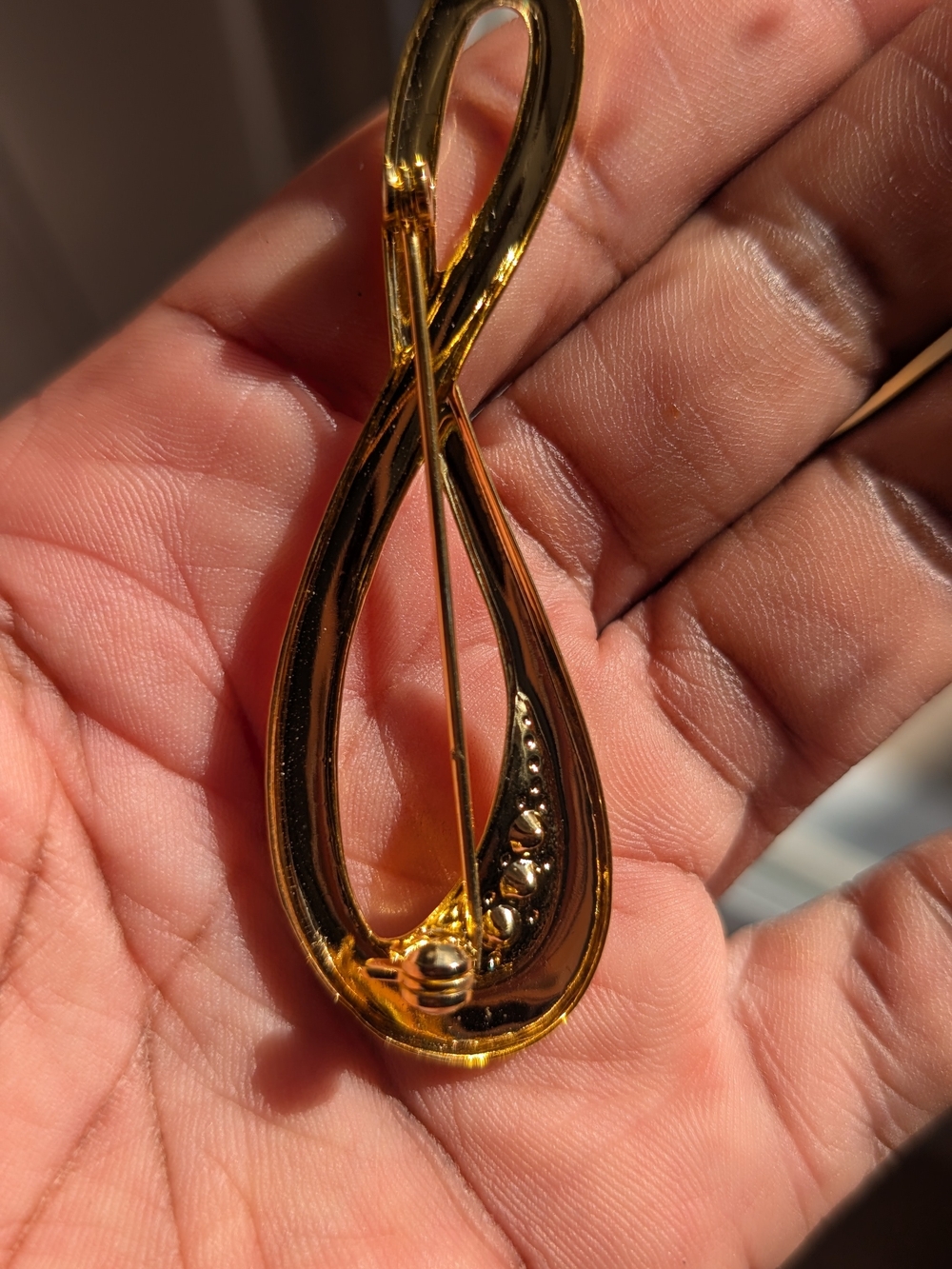 Gold-Tone Infinity Ribbon Brooch with Clear Rhinestones - Picture 3 of 3